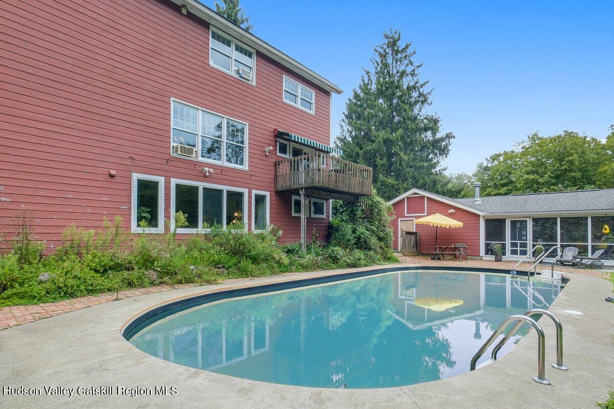 5 Longview Road Clinton, NY 12514 - Photo 35 of 44 a view of a house with swimming pool and porch