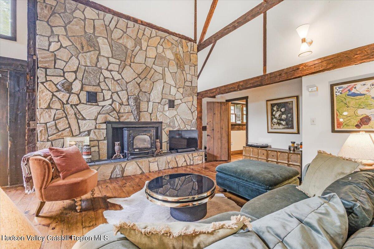 5 Longview Road Clinton, NY 12514 - Photo 10 of 44 a living room with furniture and a fireplace