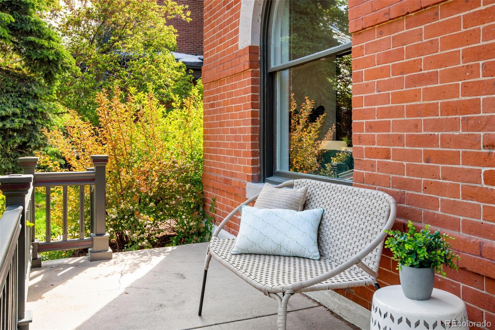 2815 Curtis Street Denver, CO 80205 - Photo 3 of 48 a view of a balcony with furniture