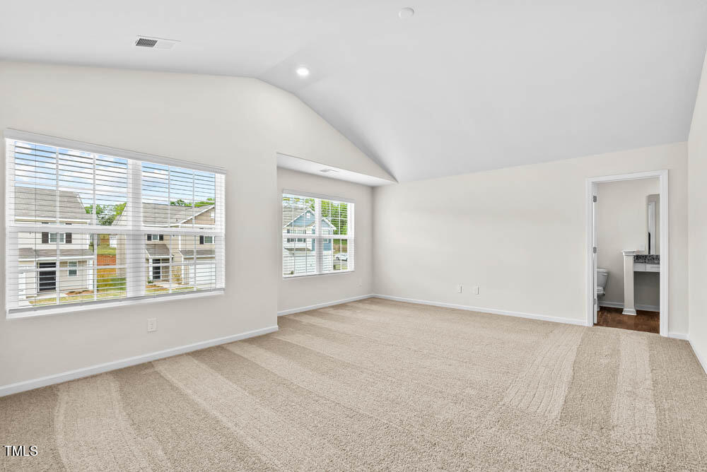 442 Crow Field Street Roxboro, NC 27574 - Photo 12 of 18 an empty room with windows