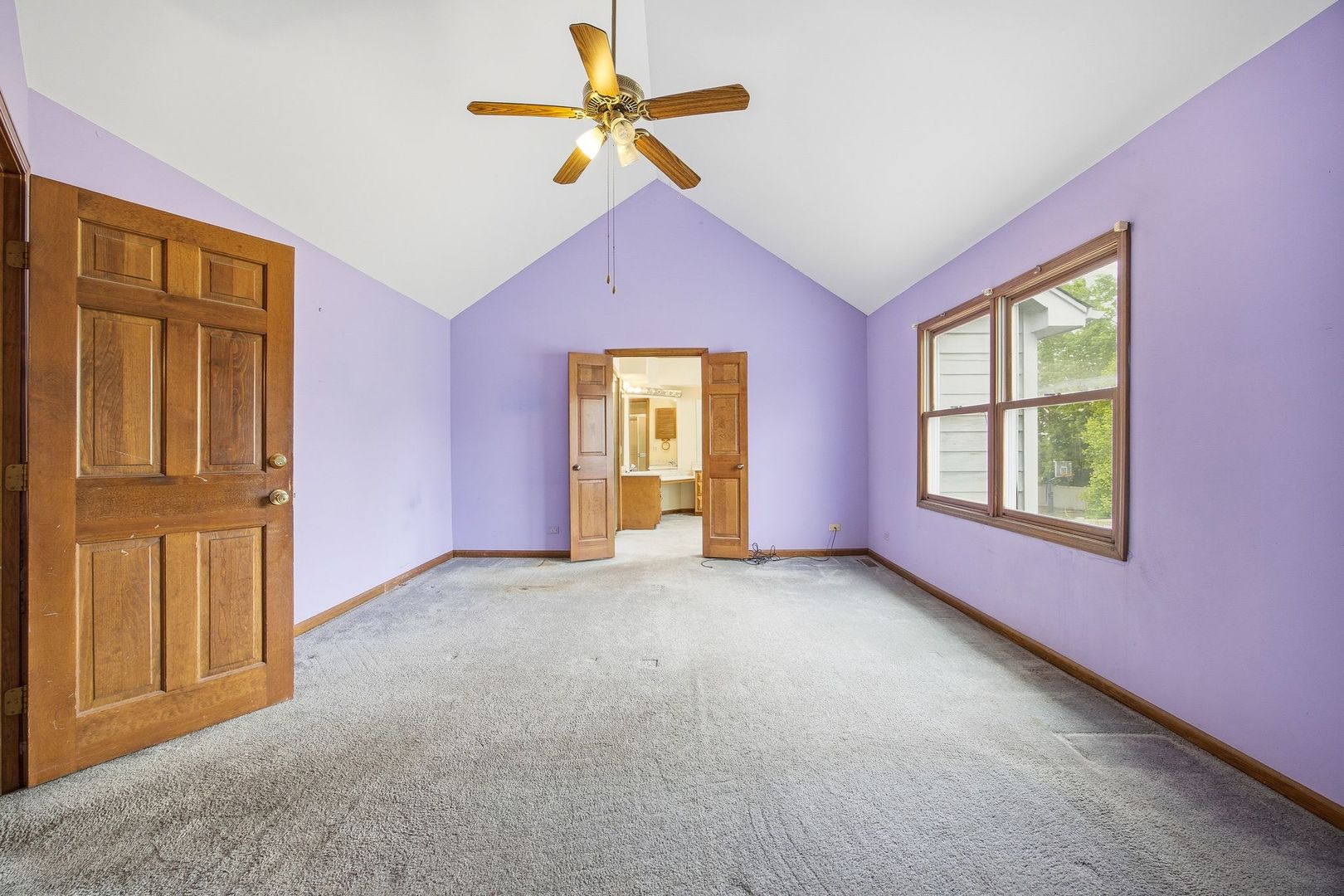 1333 Sable Drive Addison, IL 60101 - Photo 18 of 29 a view of livingroom with a ceiling fan and window