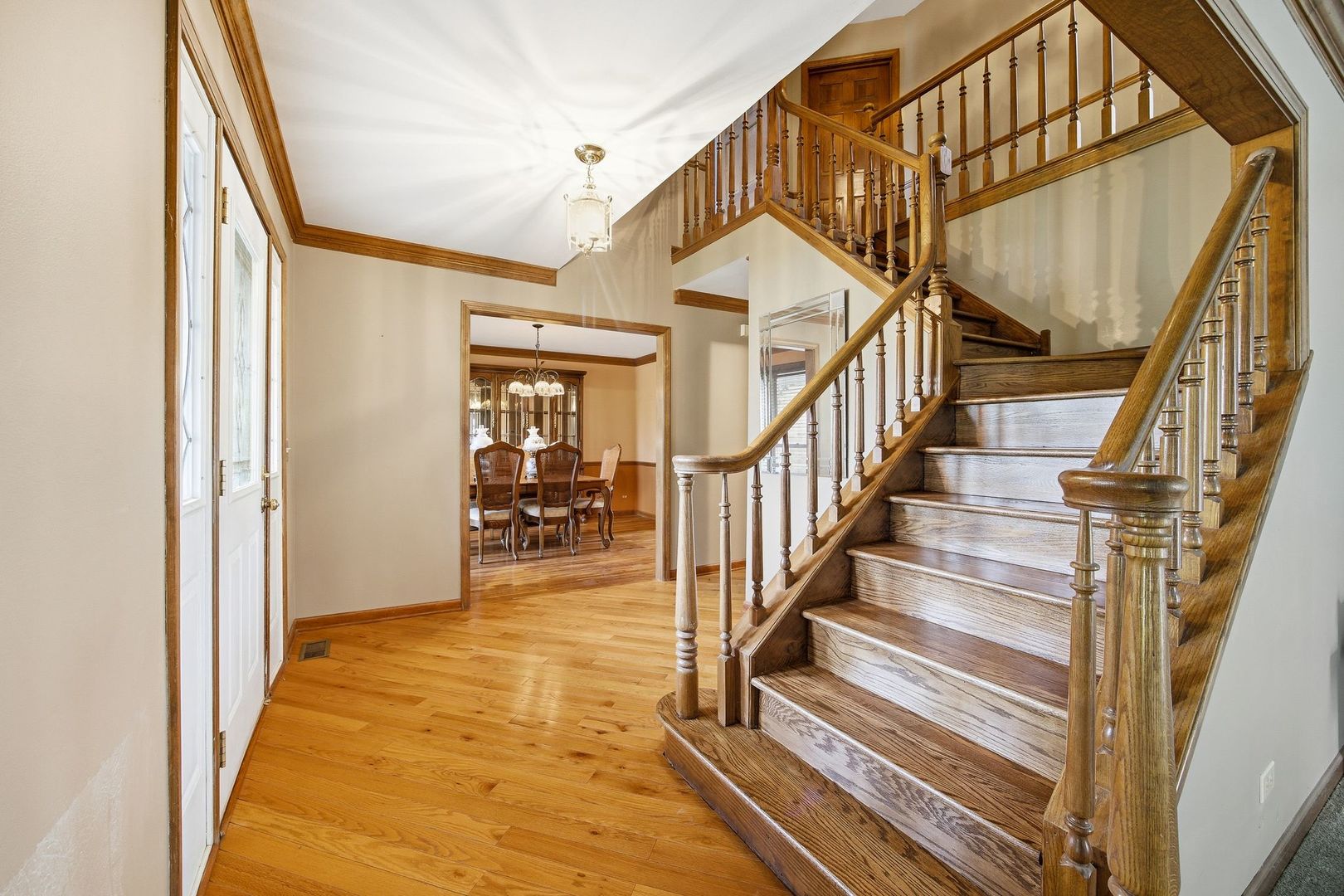 1333 Sable Drive Addison, IL 60101 - Photo 4 of 29 a view of entryway and hall with wooden floor