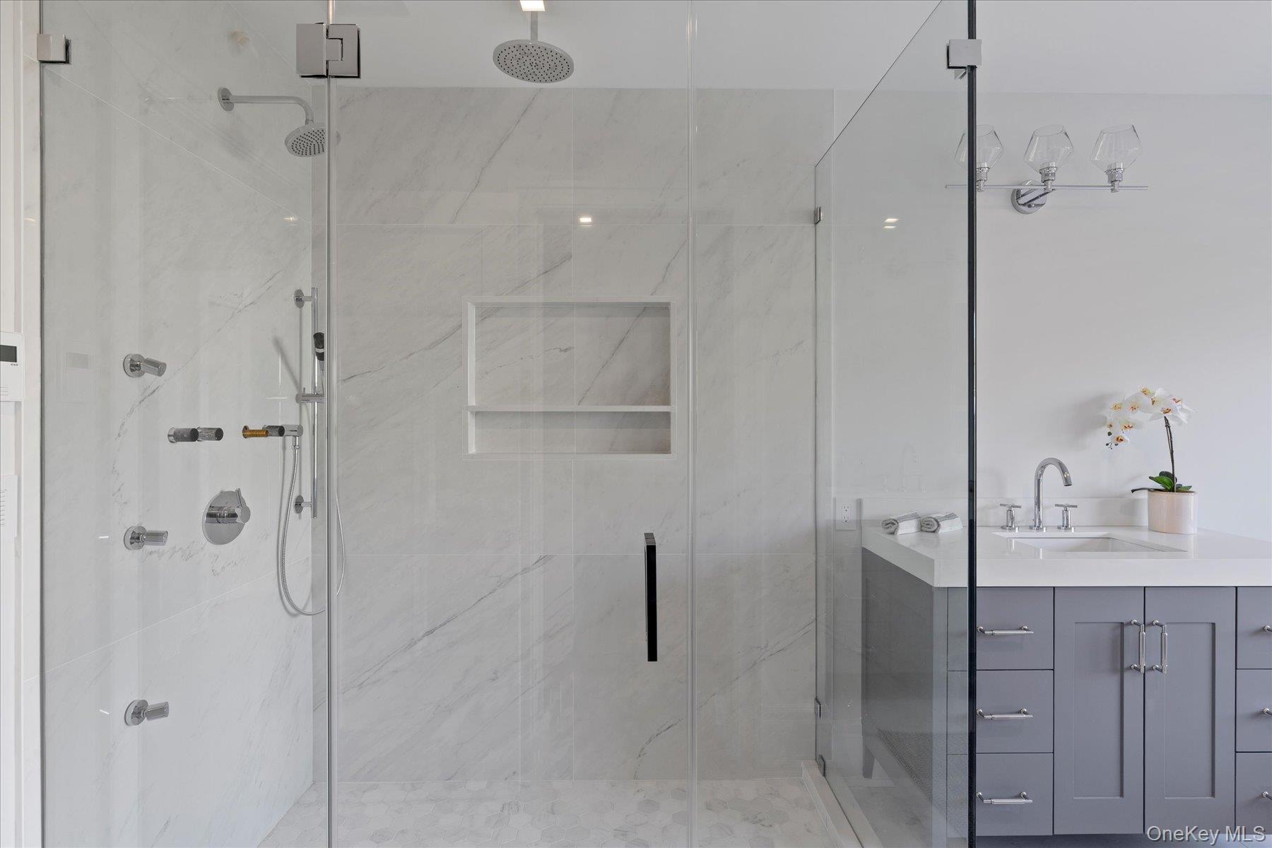 2590 Cox Neck Road Mattituck, NY 11952 - Photo 27 of 50 Well appointed primary bathroom with premium fixtures and elevated finishes