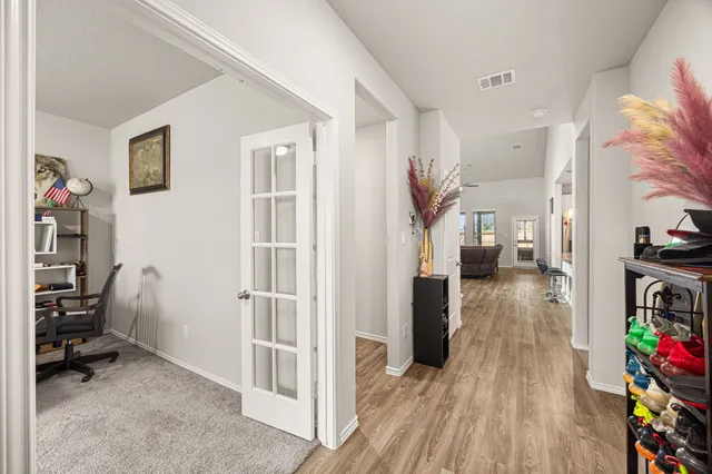 a view of livingroom with furniture and wooden floor