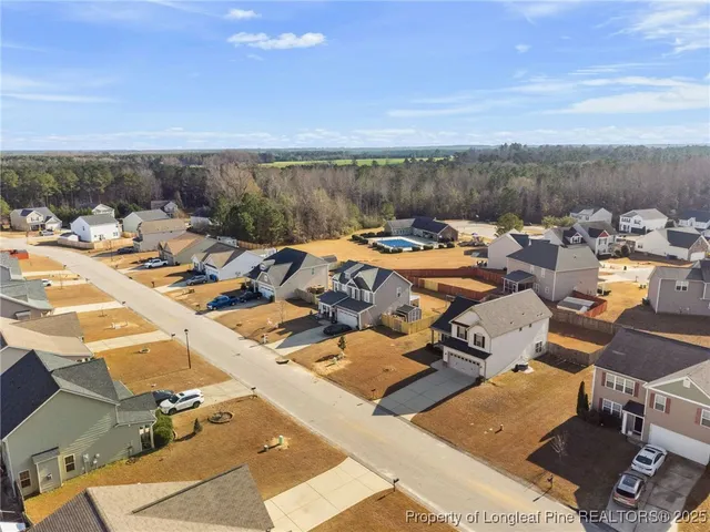 a view of a terrace with a table and chairs