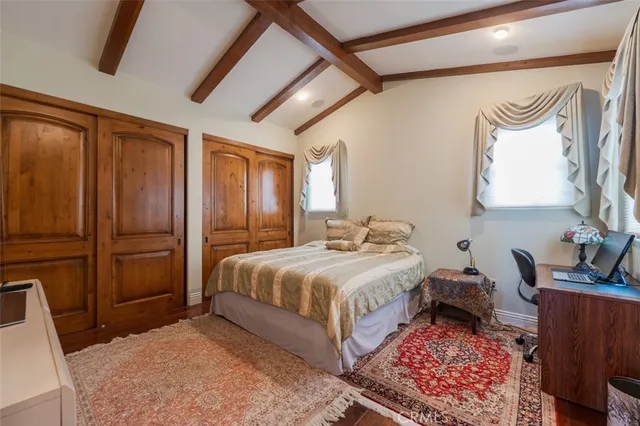 a spacious bathroom with a double vanity sink mirror and shower