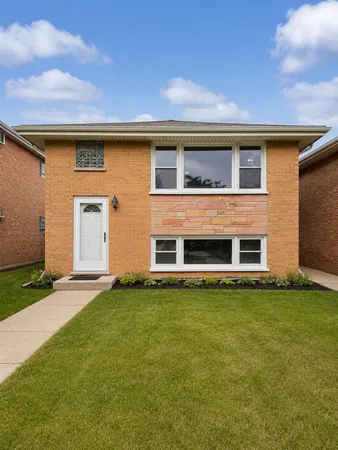 a front view of house with yard