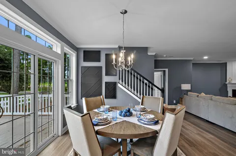a bedroom with a bed and a lamp on table