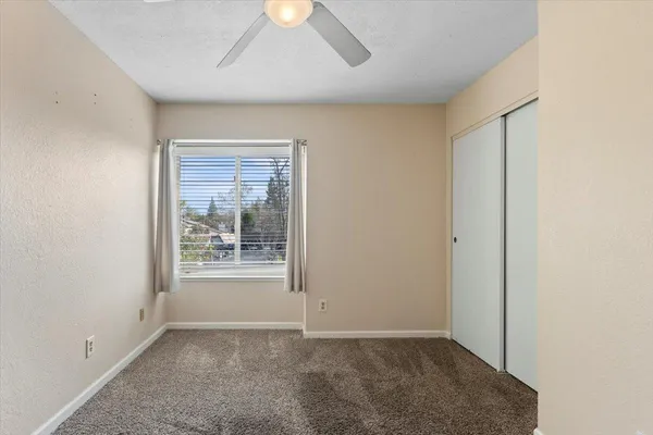 a view of a bathroom from a hallway