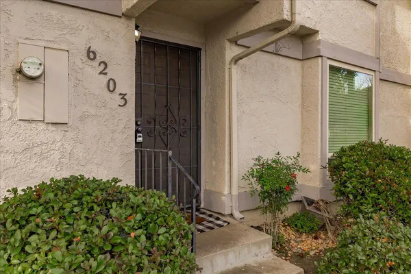 a view of a house with a patio