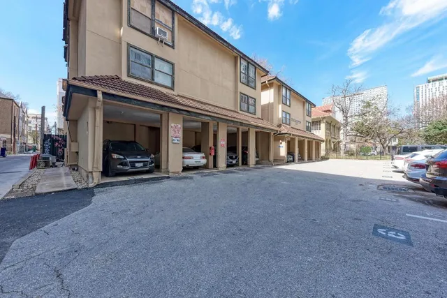 a view of a building with a street