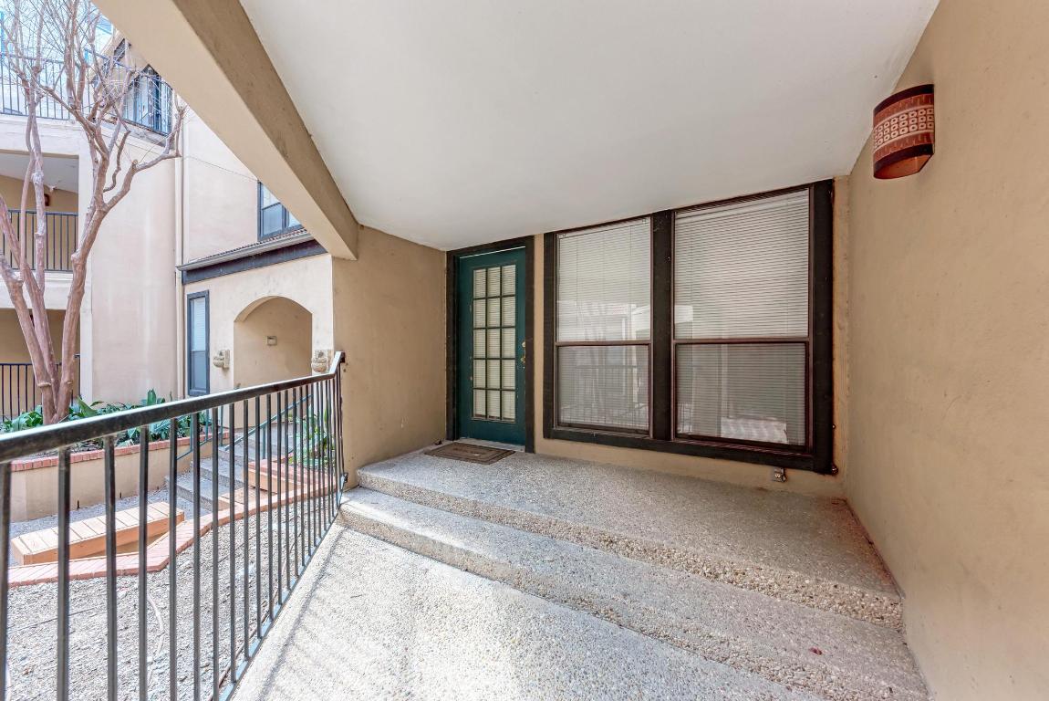 2110 Rio Grande Street, Unit 107 Austin, TX 78705 - Photo 4 of 10 a view of an empty room with a window