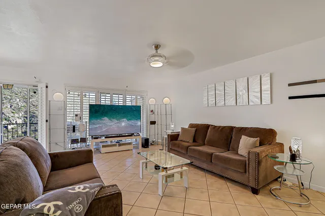 a room with furniture and flat screen tv