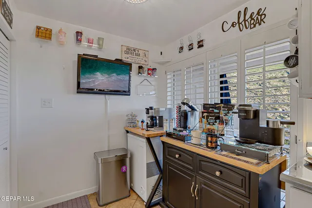 a view of a storage & utility room with two washing machine