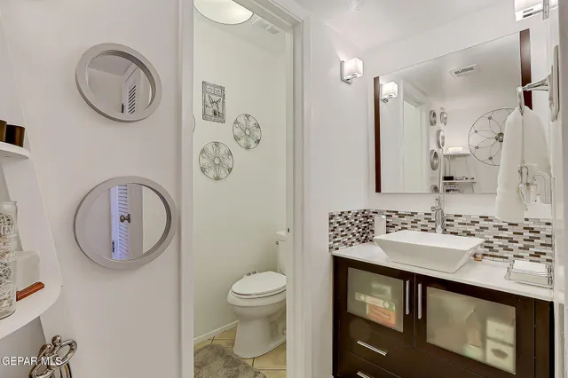 a view of city and mountain from a balcony