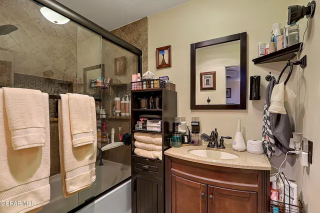 a view of a swimming pool with lounge chair