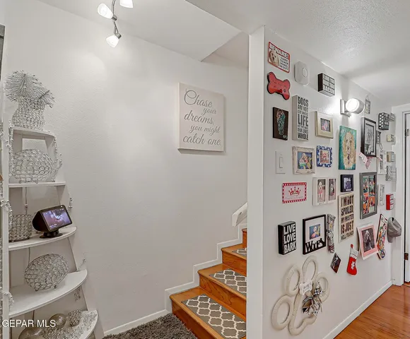 a view of house with yard outdoor seating and covered with couches