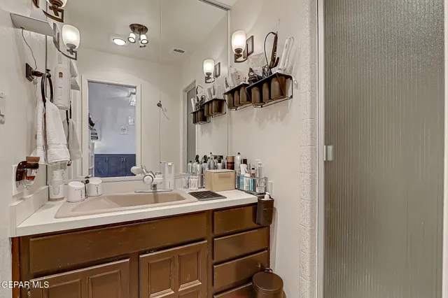 an aerial view of residential house and sandy dunes