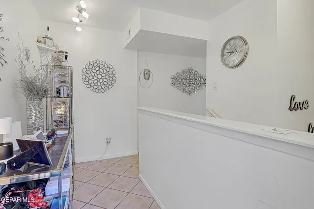 a view of livingroom with furniture and workspace