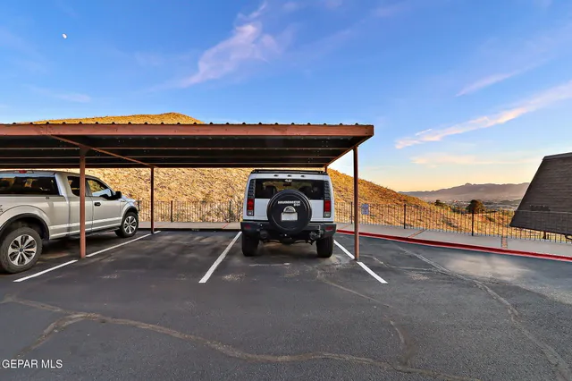 a balcony view with a potted plants