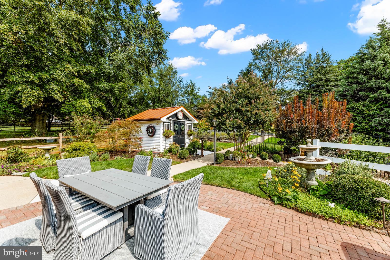 517 Georgian Road Glenside, PA 19038 - Photo 56 of 80 Charming garden retreat with vibrant blooms.