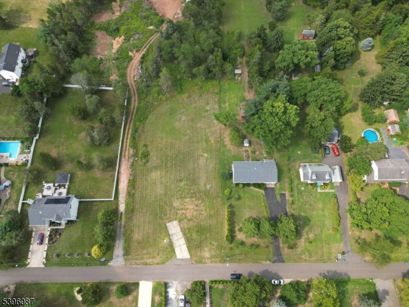 56 Gates Road Somerset, NJ 08873 - Photo 3 of 4 an aerial view of a residential houses with outdoor space