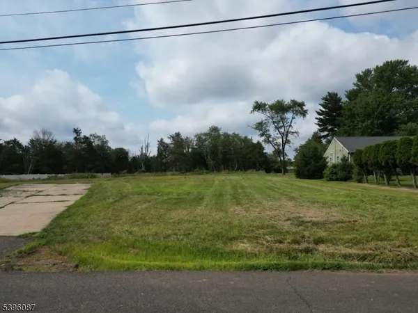 a view of a field with an outdoor space
