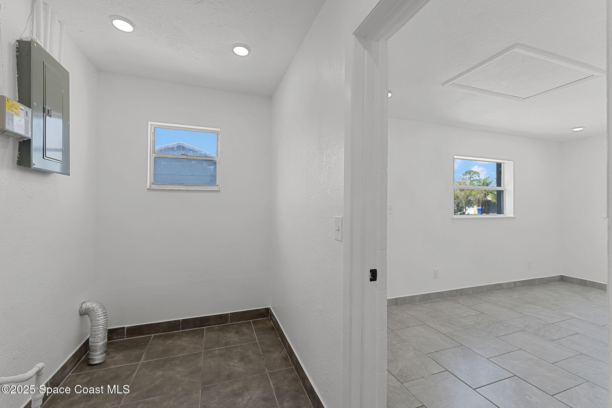 2412 Yule Tree Drive Edgewater, FL 32141 - Photo 15 of 35 an empty room with windows