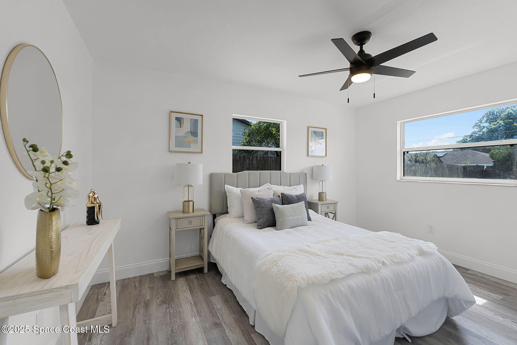 2412 Yule Tree Drive Edgewater, FL 32141 - Photo 18 of 35 a bedroom with a bed and a window