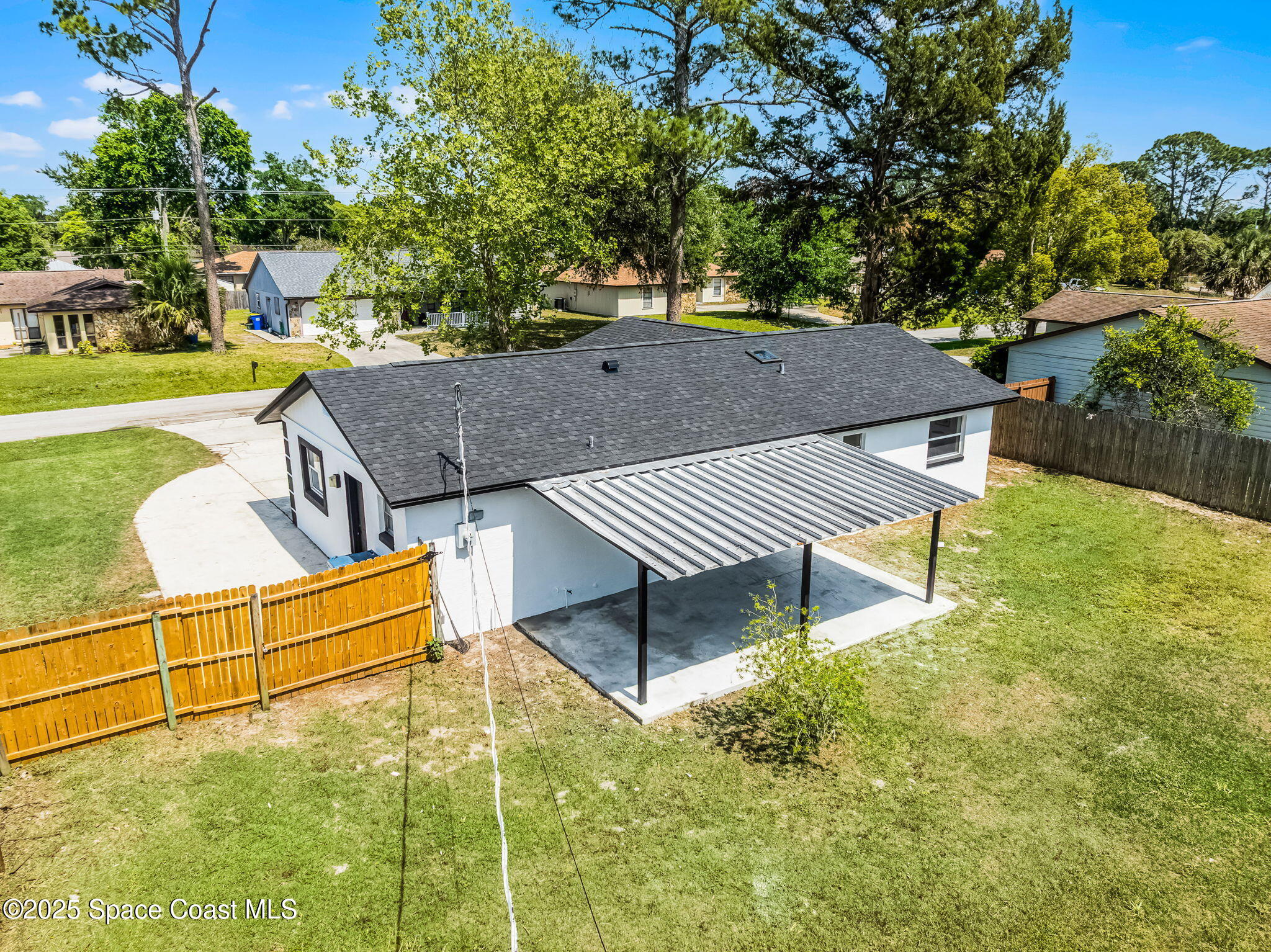 2412 Yule Tree Drive Edgewater, FL 32141 - Photo 28 of 35 a view of a terrace with a garden
