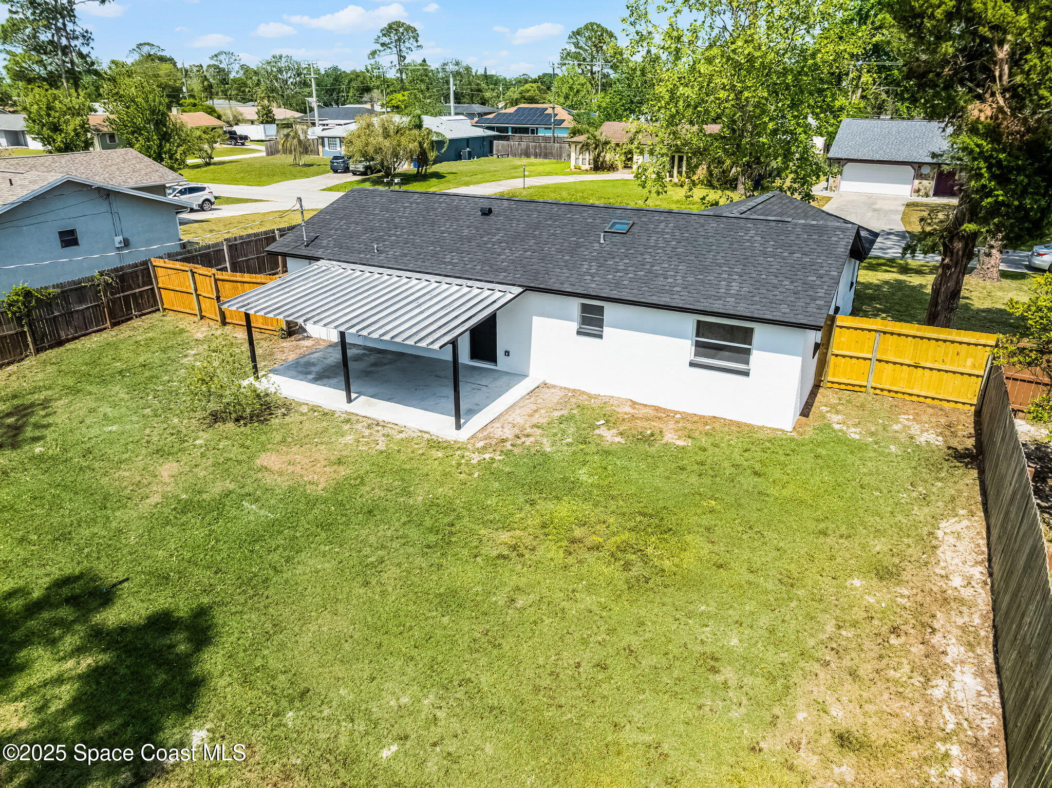 2412 Yule Tree Drive Edgewater, FL 32141 - Photo 30 of 35 a swimming pool with outdoor seating and yard
