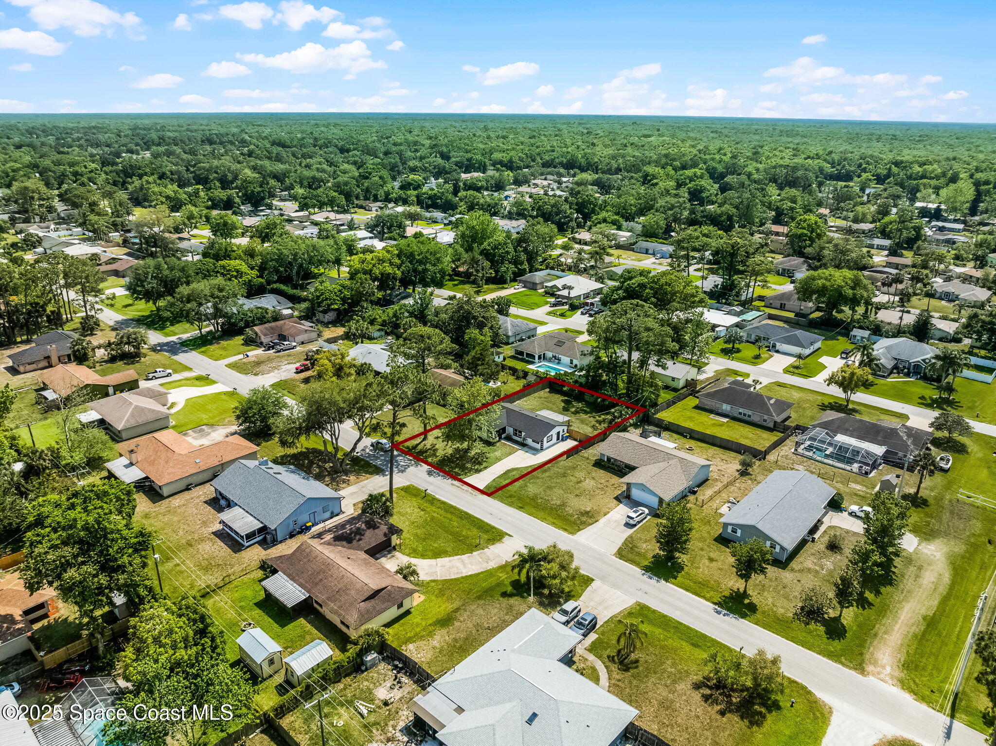 2412 Yule Tree Drive Edgewater, FL 32141 - Photo 34 of 35 an aerial view of residential houses with outdoor space