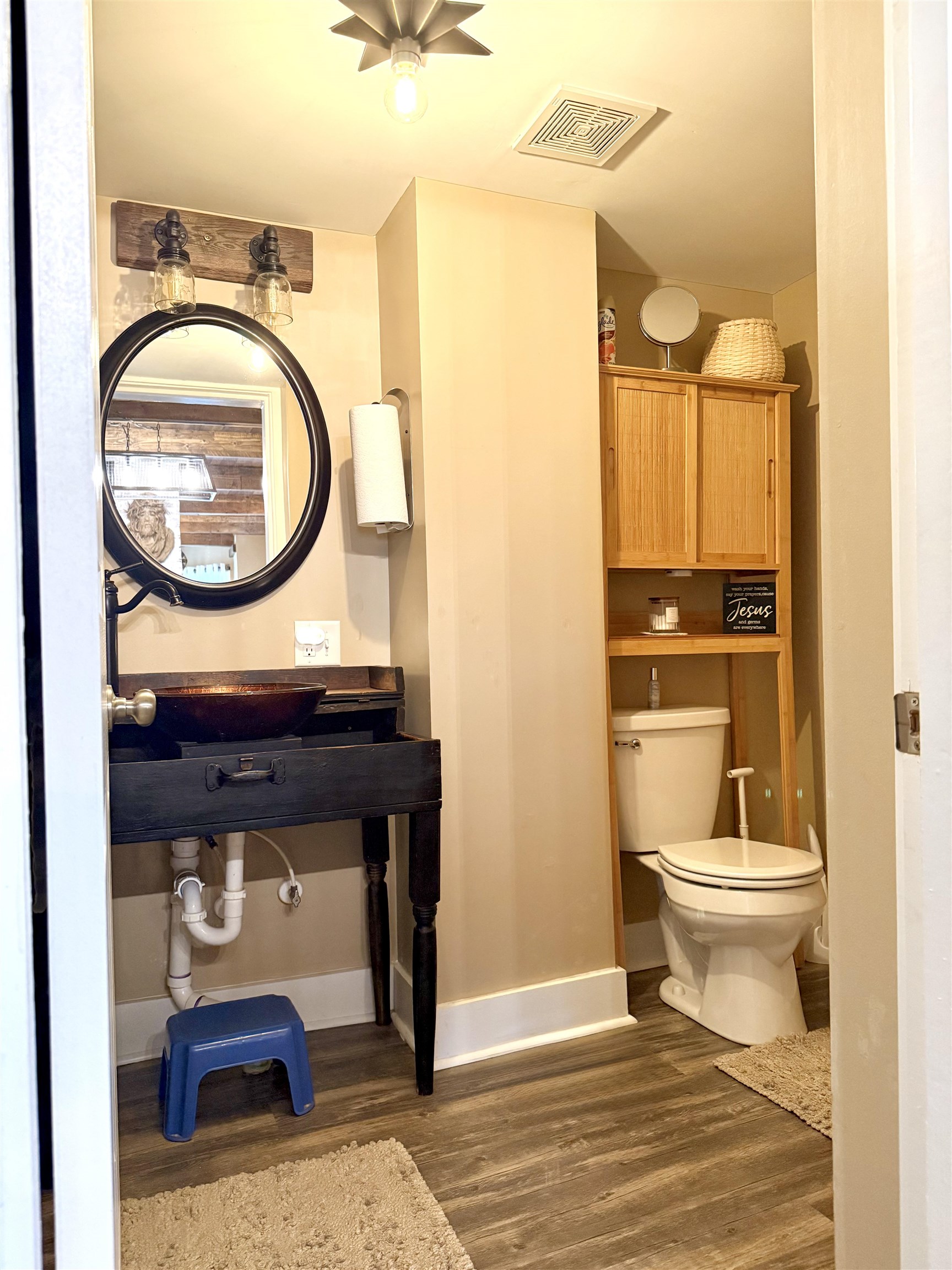 15385 Evergreen Valley Road Timberville, VA 22853 - Photo 12 of 44 a bathroom with a toilet a sink and a mirror