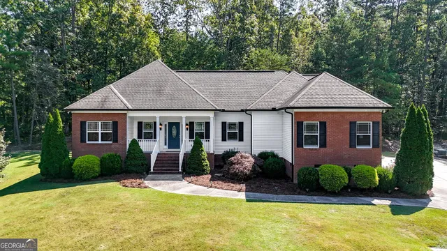 a house view with a garden space