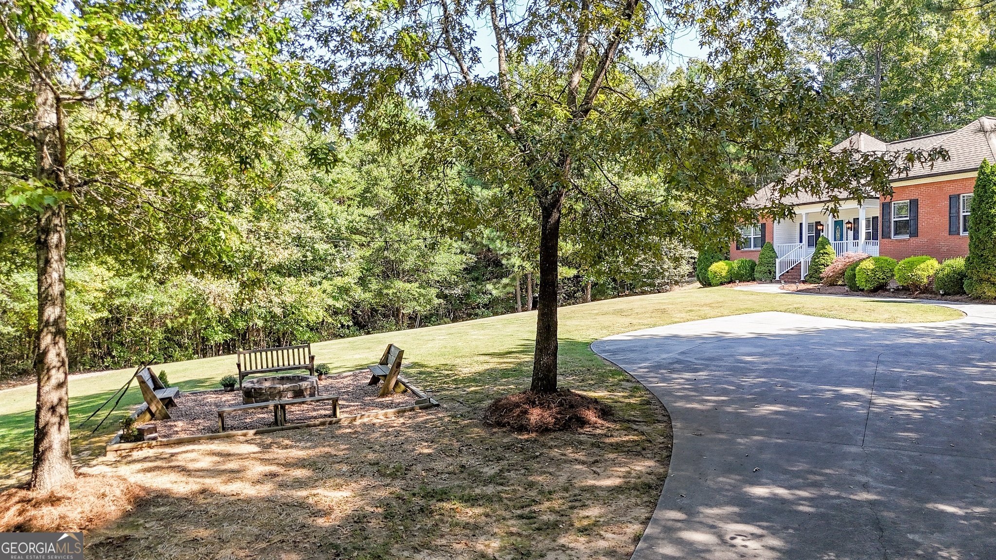 359 LaFayette Road Rocky Face, GA 30740 - Photo 19 of 54 a view of a patio with a table and chairs