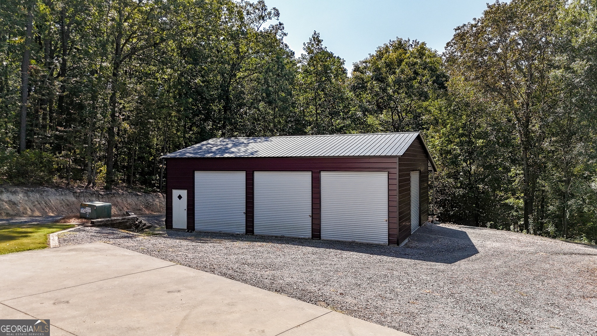 359 LaFayette Road Rocky Face, GA 30740 - Photo 24 of 54 a view of a house with a yard garage and large tree