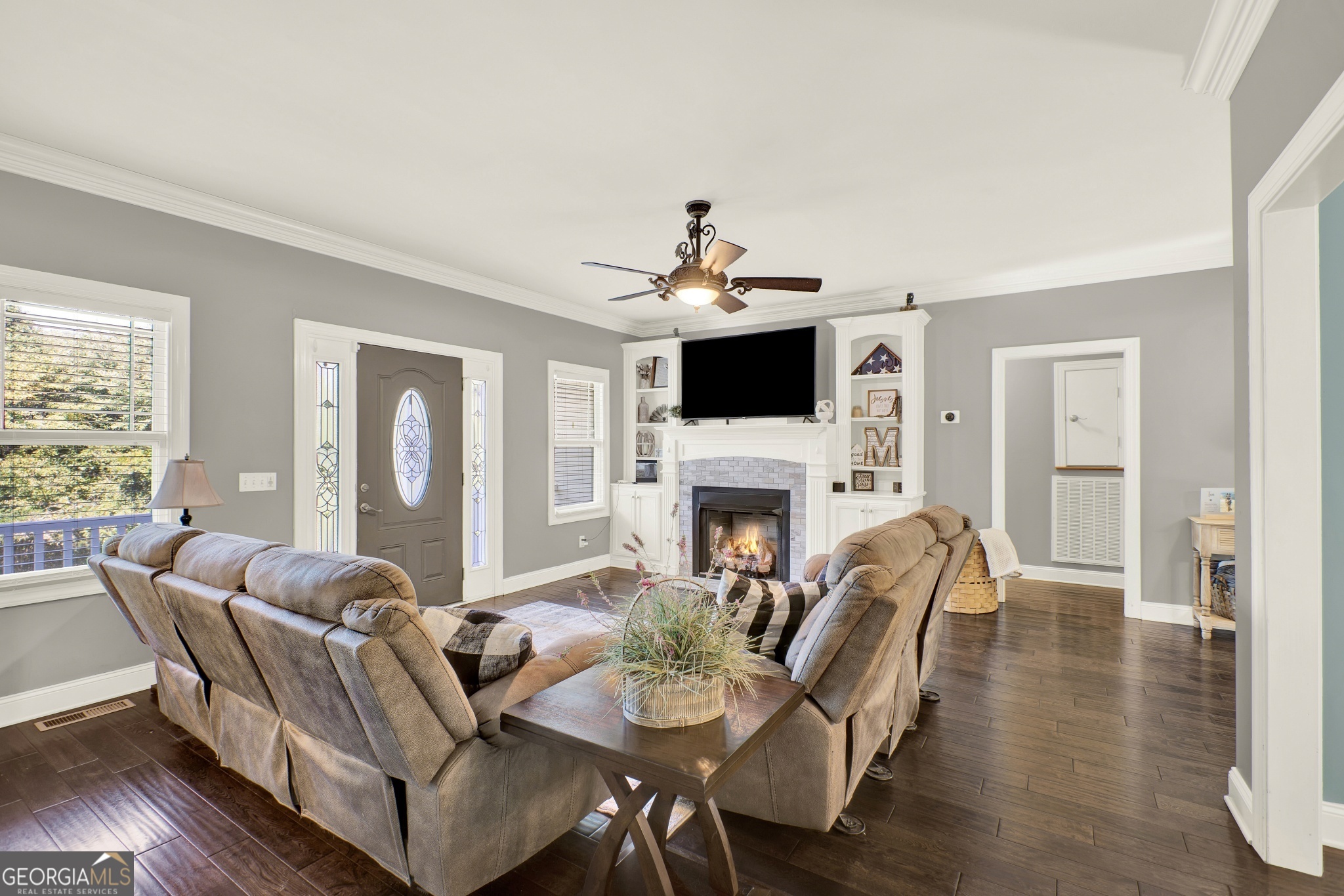 359 LaFayette Road Rocky Face, GA 30740 - Photo 29 of 54 a living room with furniture a fireplace and a flat screen tv