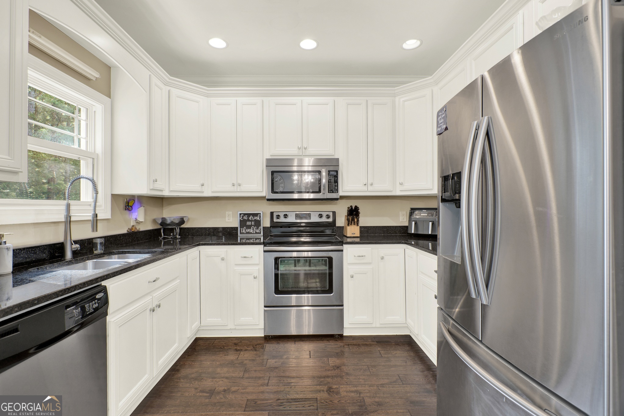 359 LaFayette Road Rocky Face, GA 30740 - Photo 35 of 54 a kitchen with stainless steel appliances a refrigerator sink and microwave