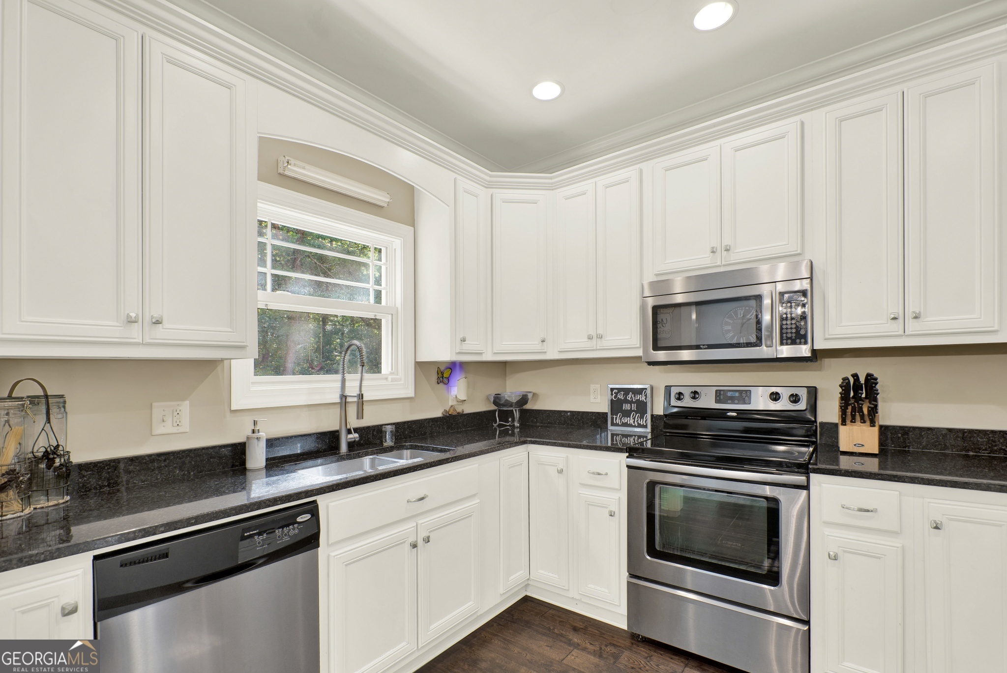 359 LaFayette Road Rocky Face, GA 30740 - Photo 36 of 54 a kitchen with stainless steel appliances granite countertop white cabinets granite counter tops and a window