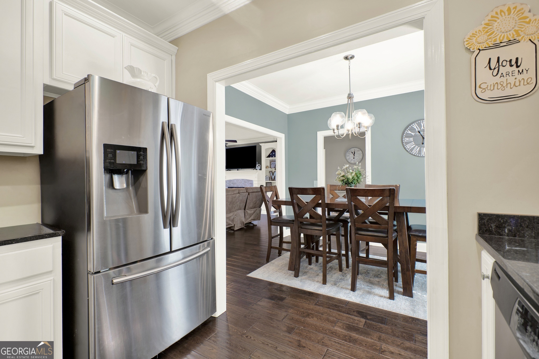 359 LaFayette Road Rocky Face, GA 30740 - Photo 37 of 54 a kitchen with stainless steel appliances a dining table chairs refrigerator and cabinets