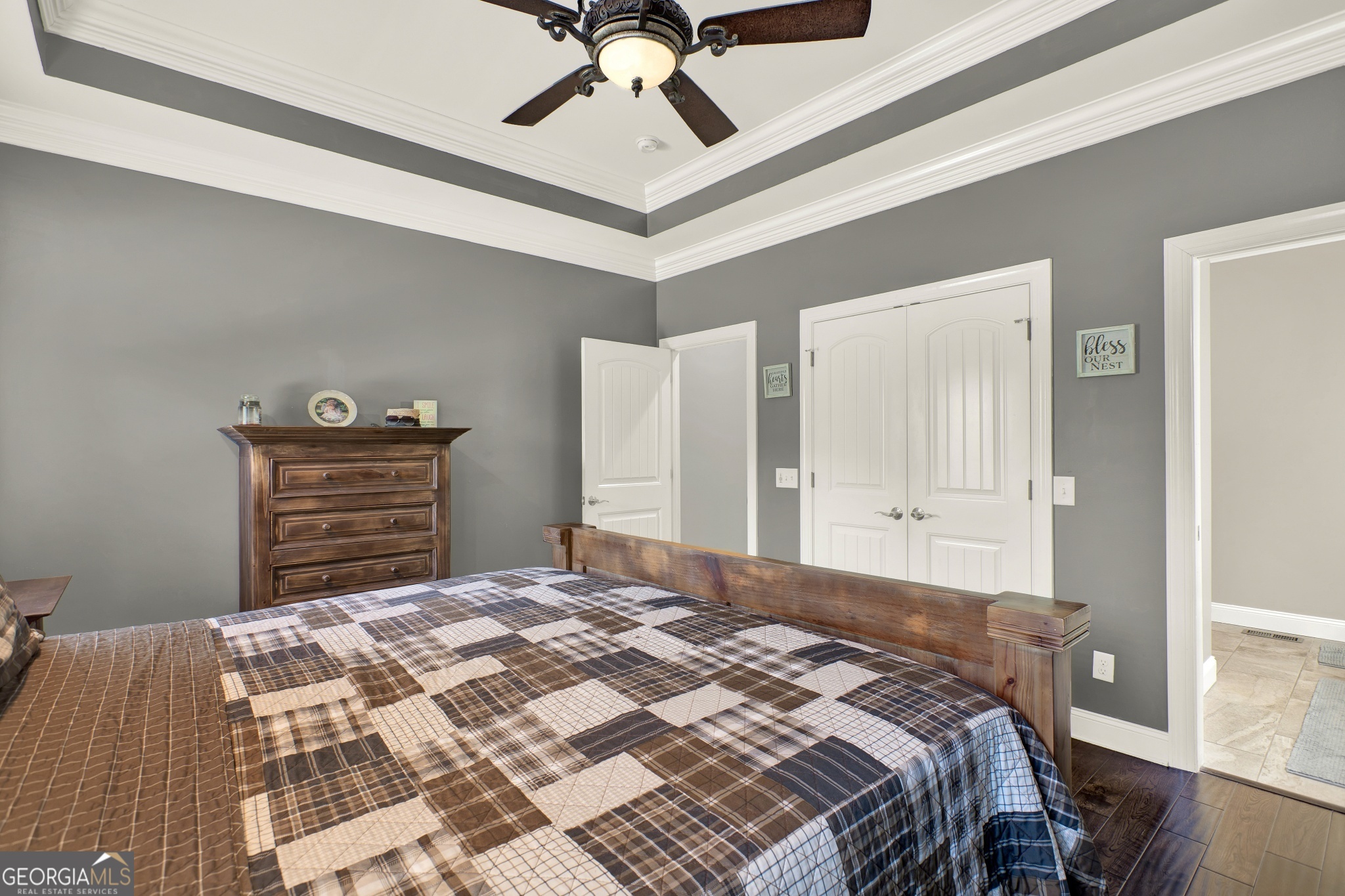 359 LaFayette Road Rocky Face, GA 30740 - Photo 40 of 54 a bedroom with a bed and a chandelier