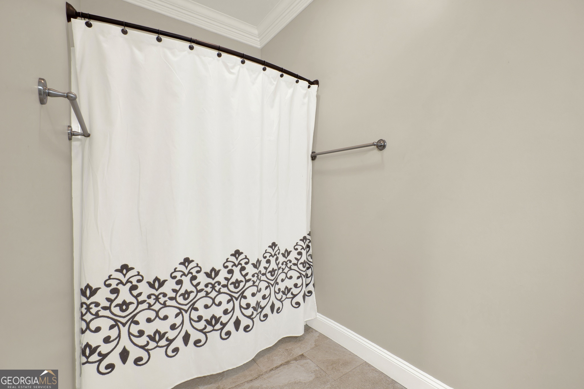 359 LaFayette Road Rocky Face, GA 30740 - Photo 41 of 54 a bathroom with a shower curtain and a window