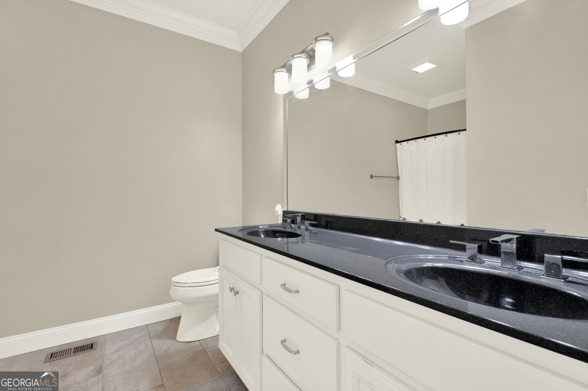 359 LaFayette Road Rocky Face, GA 30740 - Photo 42 of 54 a bathroom with a granite countertop sink a toilet and a mirror