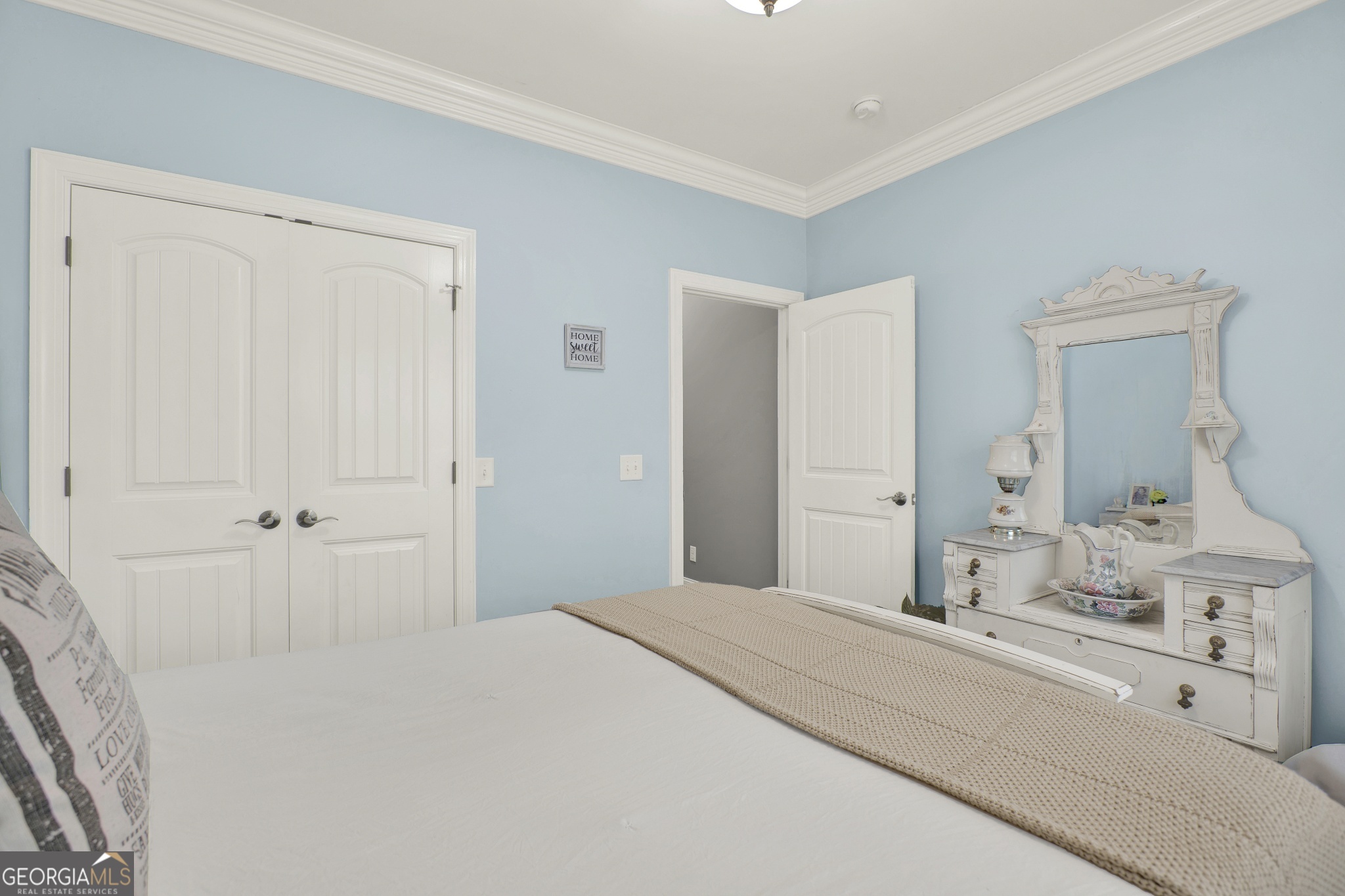 359 LaFayette Road Rocky Face, GA 30740 - Photo 45 of 54 a spacious bedroom with a bed and a cabinets