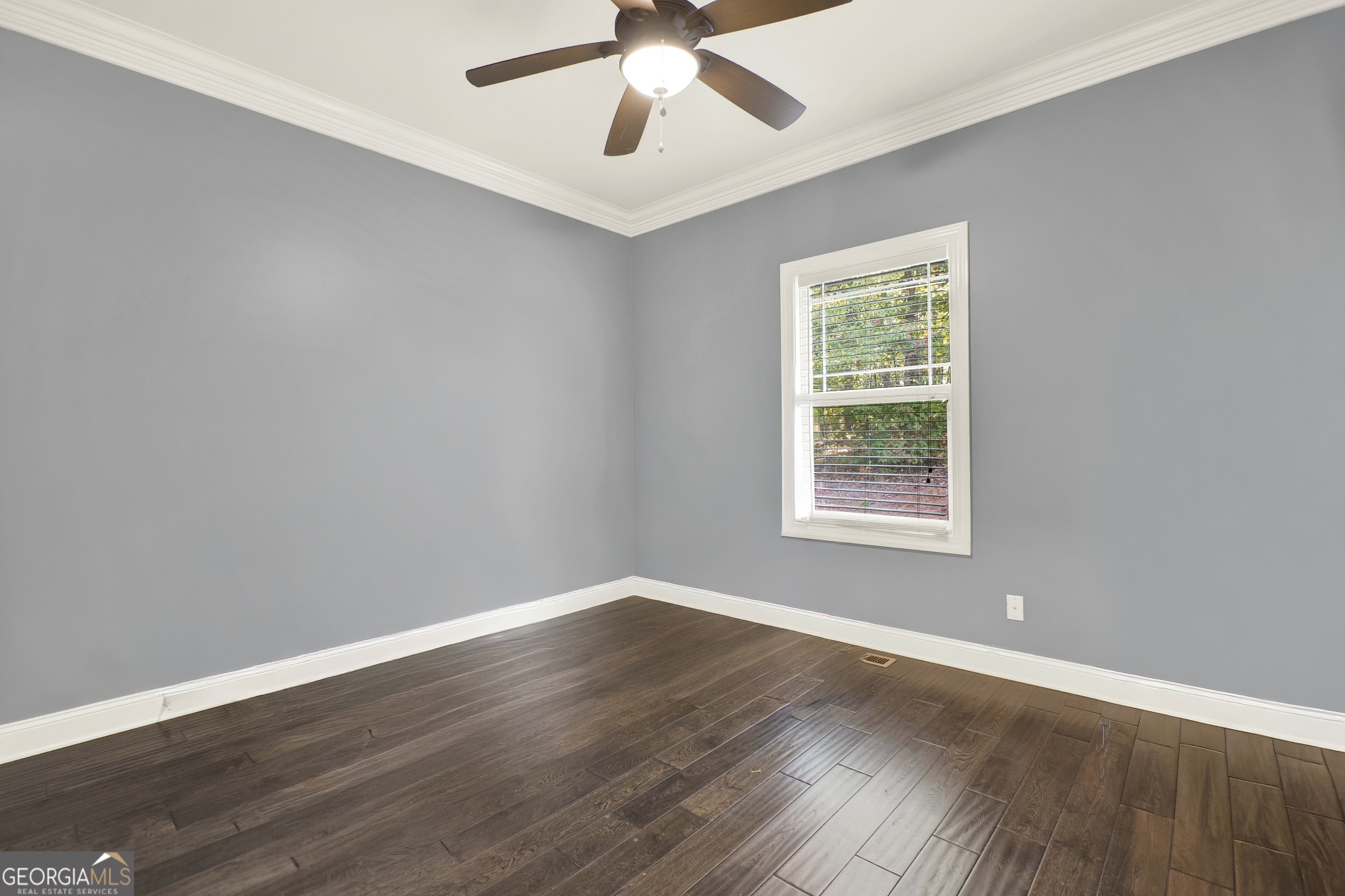 359 LaFayette Road Rocky Face, GA 30740 - Photo 48 of 54 a view of an empty room with wooden floor and a window
