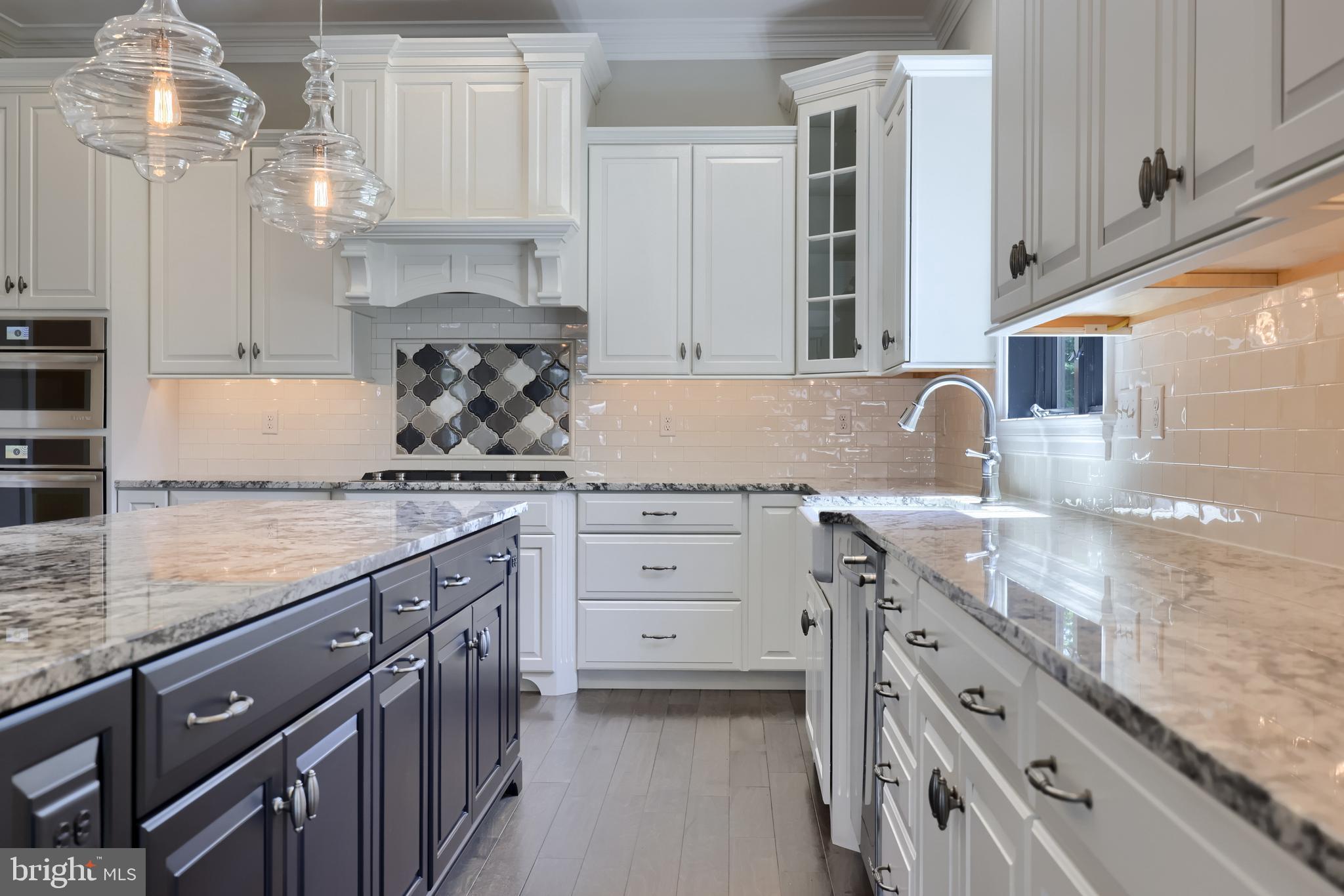 428 Southampton Drive Lititz, PA 17543 - Photo 29 of 60 a kitchen with granite countertop a sink stainless steel appliances and cabinets