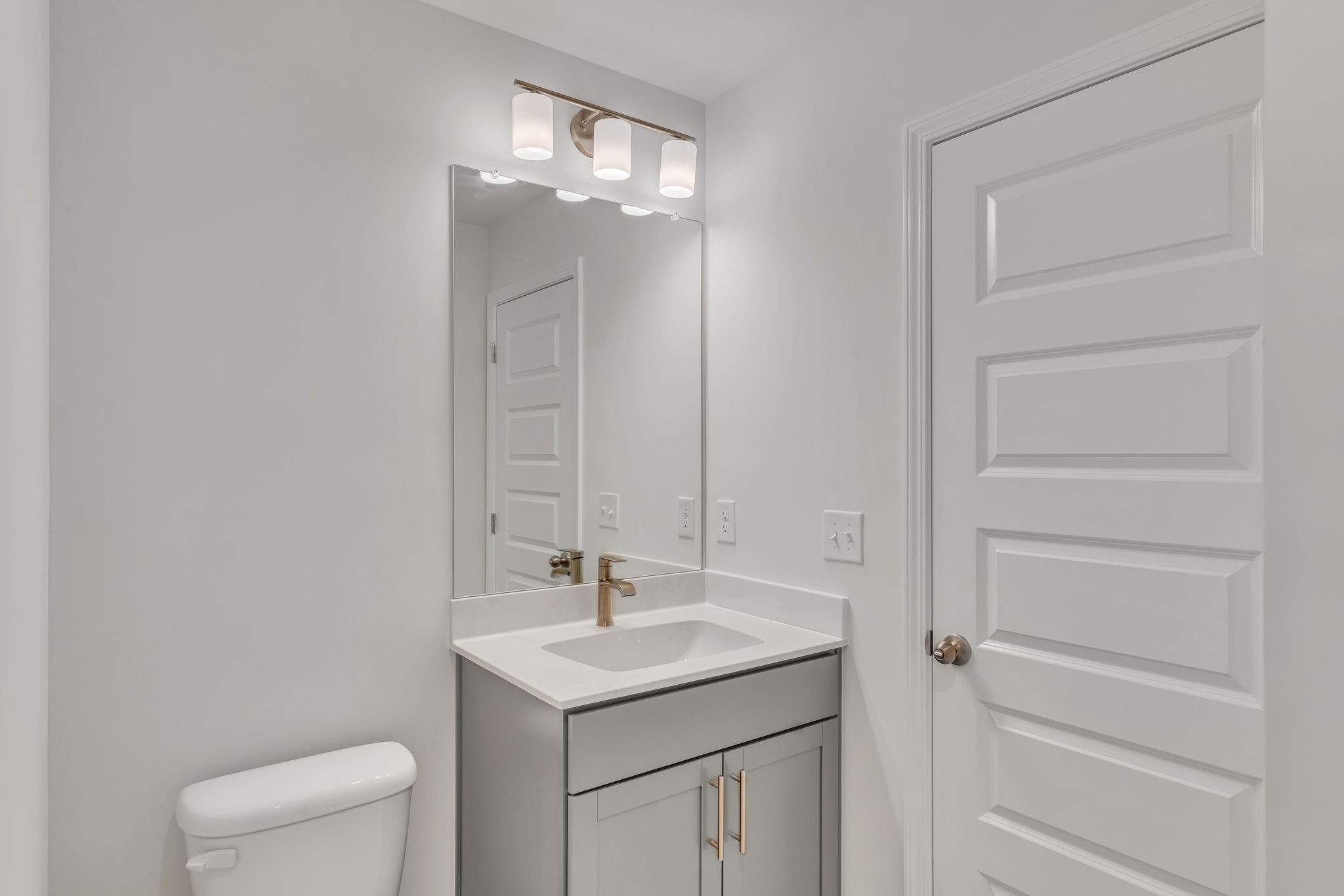 621 Club View Way Mount Juliet, TN 37122 - Photo 22 of 36 a bathroom with a sink a toilet and a mirror