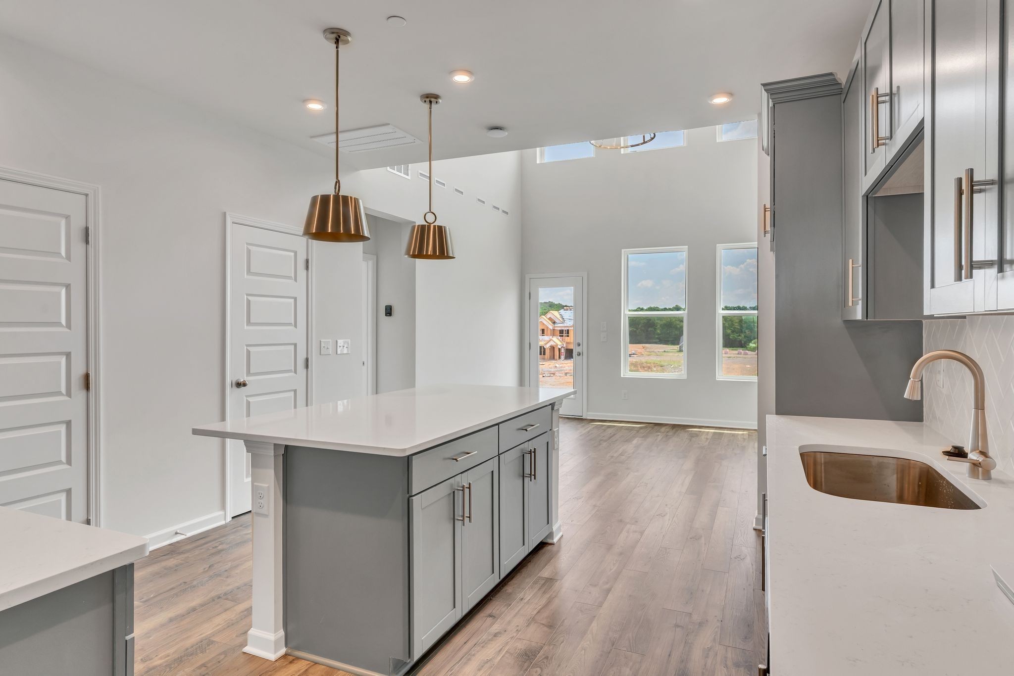 621 Club View Way Mount Juliet, TN 37122 - Photo 5 of 36 a kitchen with stainless steel appliances kitchen island a refrigerator and a sink