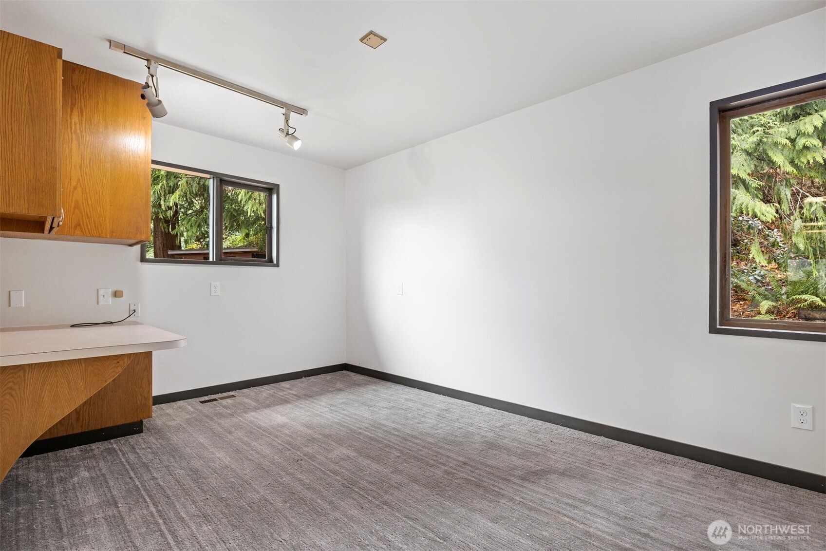 18928 Bow Hill Road Burlington, WA 98233 - Photo 21 of 39 a view of room with window and wooden floor
