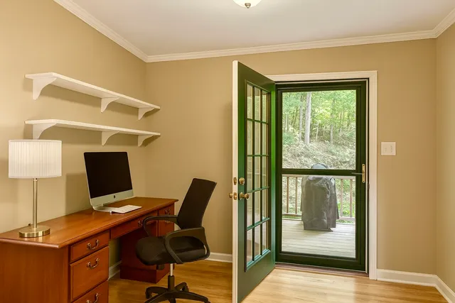 a view of workspace with bookshelf